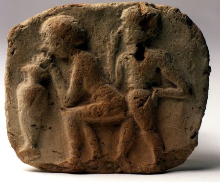 An Old Babylonian clay plaque on display at The Israel Museum depicts a couple having sex